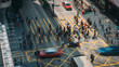 People and taxi cabs crossing a very busy crossroads in Tsim Sha Tsui district Hong Kong, China