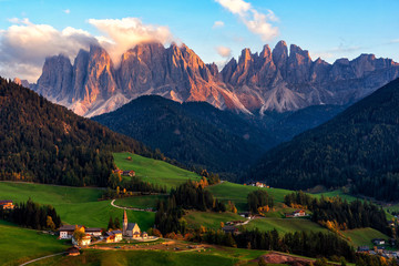 Wall Mural - Santa Maddalena village with magical Dolomites mountains in background, Val di Funes valley, Trentino Alto Adige region, Italy, Europe. Sunset view of dramatic Italian Dolomites landscape.