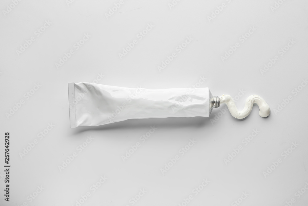 Tube with squeezed paste on white background Stock Photo | Adobe Stock