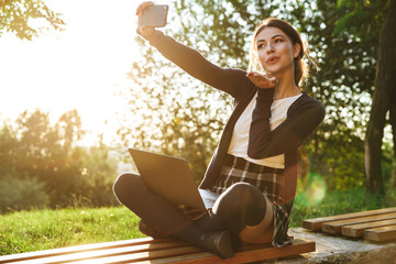 Wall Mural - Cheerful teenage girl wearing uniform