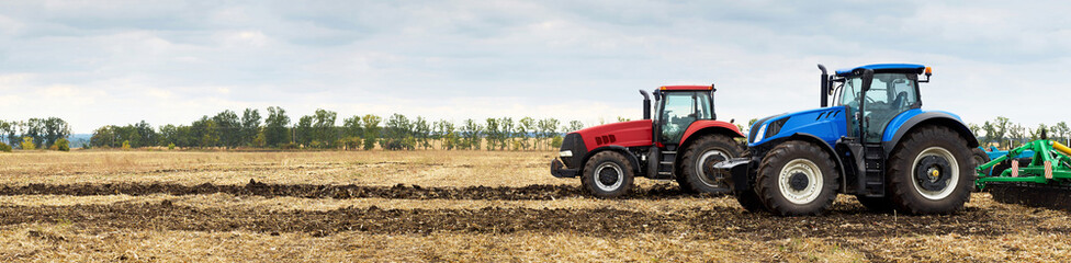 Poster - Two tractors with plows working in the field