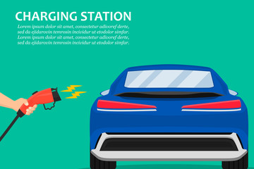 Poster - Hand holding charging plug for electric car charging station
