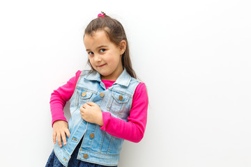 Portrait of a emotional beautiful little girl. Isolated on white background.