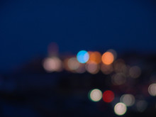 Night City Lights Bokeh Of Defocused Vivid Colorful Circles Of Light In Blue Hour