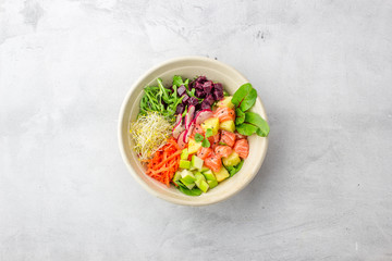 Wall Mural - poke bowl fresh salad with tomatoes and cucumbers