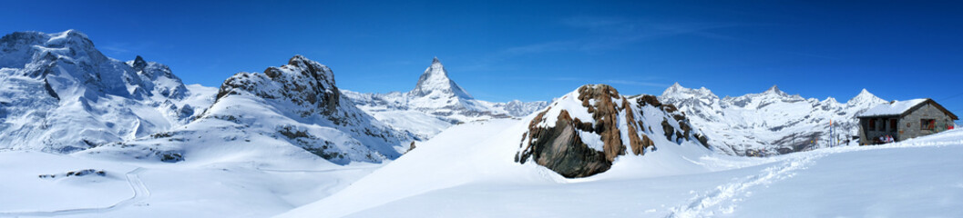 Wall Mural - Beautiful panoramic view of the Matterhorn Mountain in winter, Zermatt, Switzerland.