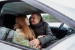 © keleny - Ordinary cute couple in the car and autumn forest background