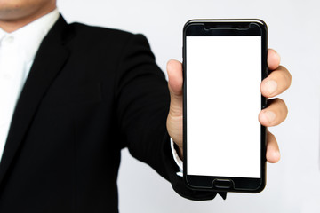 Wall Mural - Male hand holding a  smartphone on white background, business concept.