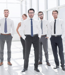 Wall Mural - group of young employees standing in the office