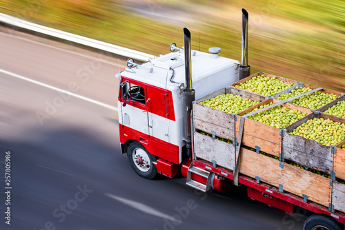 Old Cab Over Big Rig Semi Truck Transporting Pears In Wooden Boxes