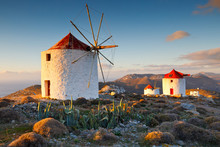 Traditional Windmills Near Chora Village On Amorgos Island In Greece. 