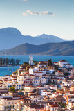 Fototapeta  - View of Poros island and mountains of Peloponnese peninsula in Greece. 