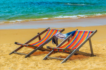 Canvas Print - Deck chairs at the beach