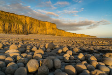 The Stones And Cliffs Of Llantwit Major Beach In The Evening Sun, South Glamorgan, Wales, UK