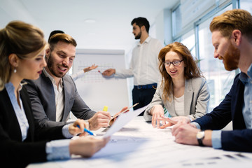 Business people working together on project and brainstorming