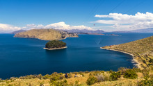 Terraced Landscape Of Isla Del Sol With Andes Mountains In The Background On The Bolivian Side Of Lake Titicaca