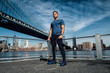 © Nick Starichenko - Athlete man with jump rope ready for outdoors workout in New York City