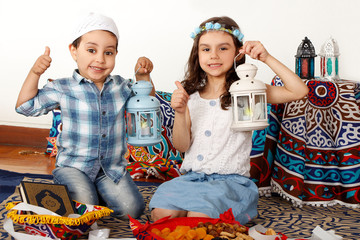 Happy children playing with lanterns in holy month Ramadan