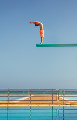 Boy ready to dive into pool