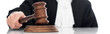 Panoramic shot of judge in judicial robe holding gavel isolated on white