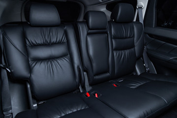 Wall Mural - Сlose-up of the car  black interior:  black leather rear seats and seat belts .