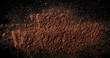 Cocoa powder isolated on black background and texture
