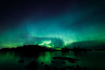beautiful northern lights over lake