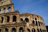Fototapeta  - ancient colosseum in rome on blue sky background 