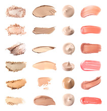 Set With Swatches Of Lipsticks, Eye Shadows And Skin Foundations On White Background, Top View