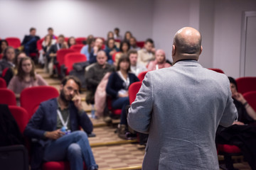 Wall Mural - successful businessman giving presentations at conference room