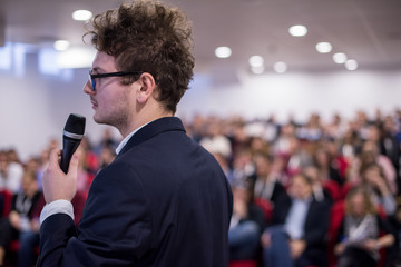 Wall Mural - successful businessman giving presentations at conference room