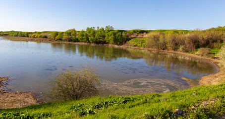 Pond in spring steppe as background