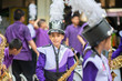© wckiw - Little boy in purple white uniform play saxophone in  marching band