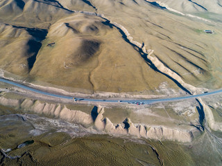 Wall Mural - A bird's eye view of Xinjiang Bayinbrook Grassland Highway 