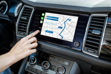 Touching A Monitor With Navigation Map Of The Modern Car, Close-up View