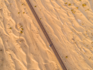 Wall Mural - aerial view of highway on the gobi desert xinjiang， 