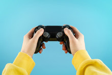  Black Joystick In Hands Isolated On Pastel Blue Background