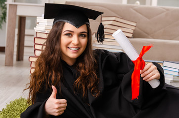 Young female student graduating from the university