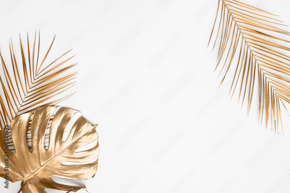 Golden tropical leaves on white background - obrazy, fototapety, plakaty 