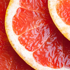 Wall Mural - Slices of grapefruit. Grapefruit slices background.