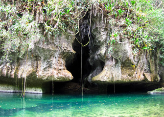 Wall Mural - A cave in the shape of a keyhole in a very remote piece of jungle in central Belize.