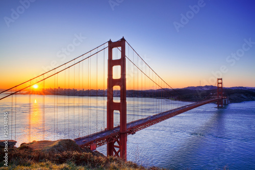 Fotografering  Sunrise over the golden gate bridge San Francisco. california usa