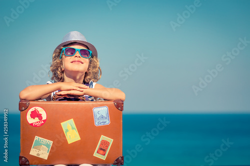 Child enjoys a summer vacation at the sea