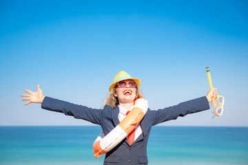 Poster - Successful young businesswoman on a beach