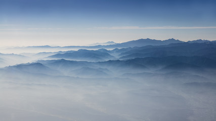 Wall Mural - Aerial view of the clouds and mountains of Taiwan. Wonderful mountain from above