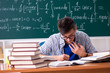 © Elnur - Young male student studying math at school
