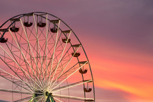 Ferris Wheel At The Sunset