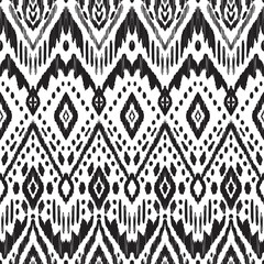 Wall Mural - Black and white seamless background. Ethnic ikat ornament. Vector illustration. Tribal pattern. Can be used for textile, wallpaper, wrapping paper, greeting card backdrop, print.