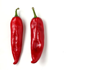 Red sweet pepper is located on a white background, copy space