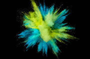 Wall Mural - Colored powder explosion. Abstract closeup dust on backdrop. Colorful explode. Paint holi